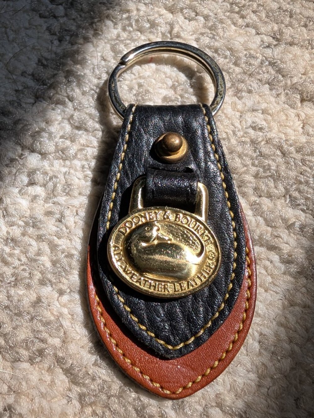 Vintage Dooney& Bourke (AWL) brass duck key fob